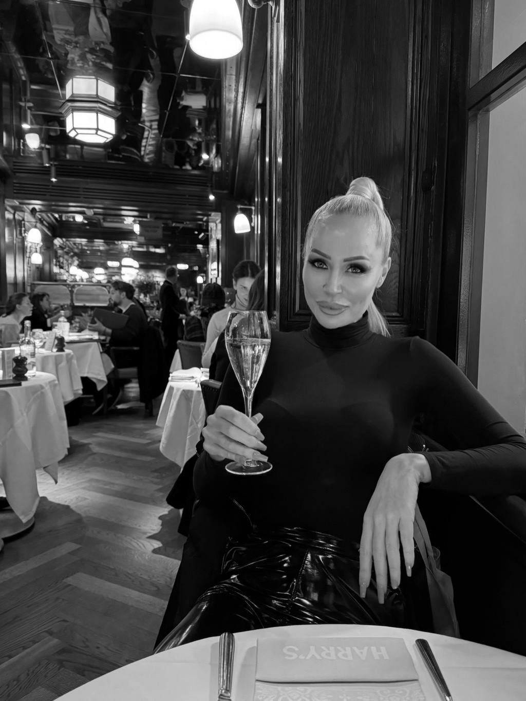 A table for one set in a dark London restaurant